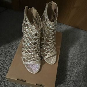 Gold Heels. Only once for a wedding. Very sparkly, like new. Size: 7.5
